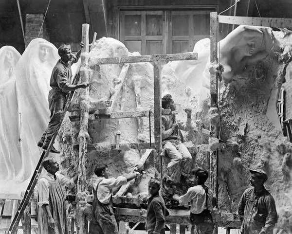 Lorado Taft and apprentices sculpting a portion of the Fountain of Time at Midway Studios, circa 1919. Reprinted from <a data-cke-saved-href='/Products/9781467143226' href='/Products/9781467143226'>Chicago’s Artist Colonies</a> by Keith M. Stolte, courtesy of the University of Chicago Photographic Archive (pg. 17, The History Press, 2019). Lorado Taft and apprentices sculpting a portion of the Fountain of Time at Midway Studios, circa 1919.