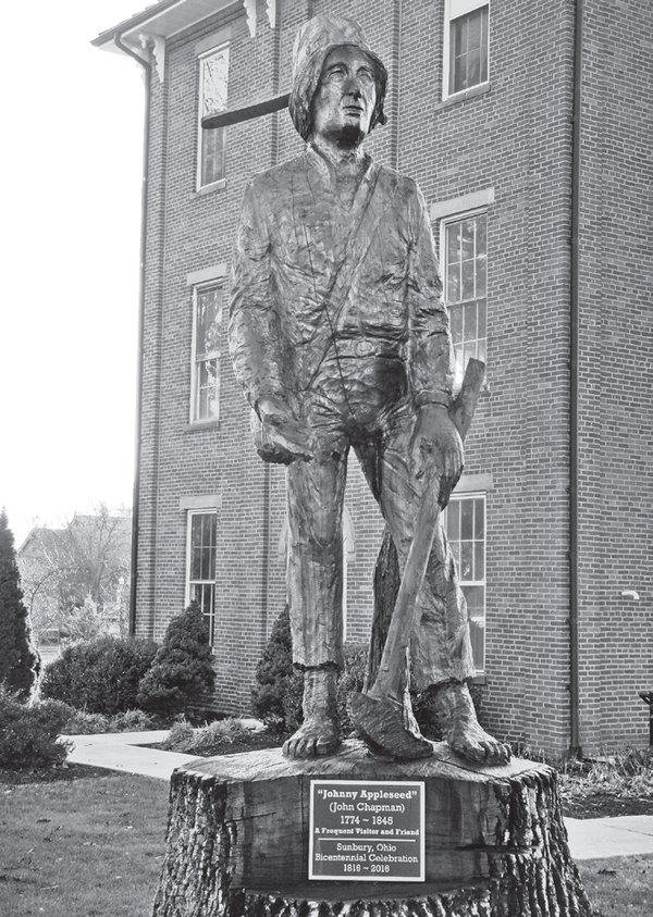 A statue of Johnny Appleseed. Reprinted from <a data-cke-saved-href='/Products/9781467136686' href='/Products/9781467136686'>Central Ohio Legends & Lore</a> by James A. Willis, courtesy of the author (pg. 41, The History Press, 2017).