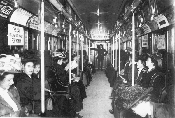 Women riding one of the early New York City subways. Reprinted from <a data-cke-saved-href='/Products/9780738510866' href='/Products/9780738510866'>New York City Subways</a> by Tom Range Sr., courtesy of Life in Old New York Photo Postcards (pg. 67, Arcadia Publishing, 2002). Women riding one of the early New York City subways.