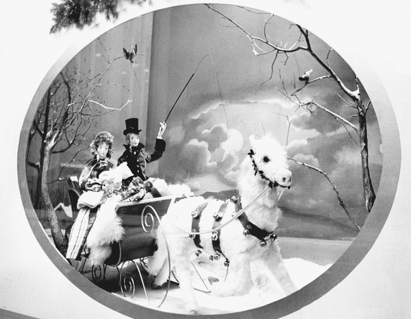 Reprinted from <a data-cke-saved-href='/Products/9780738560762' href='/Products/9780738560762'>Cleveland’s Department Stores</a> by Christopher Faircloth (pg 77, Arcadia Publishing, 2009). Although the art of department store windows has largely fallen by the wayside in the 21st century, many fondly remember afternoons and evenings spent gazing into beautifully crafted scenes celebrating the holiday and winter season. In this Halle’s window, a traditional sleigh ride heralds the arrival of winter festivities.
