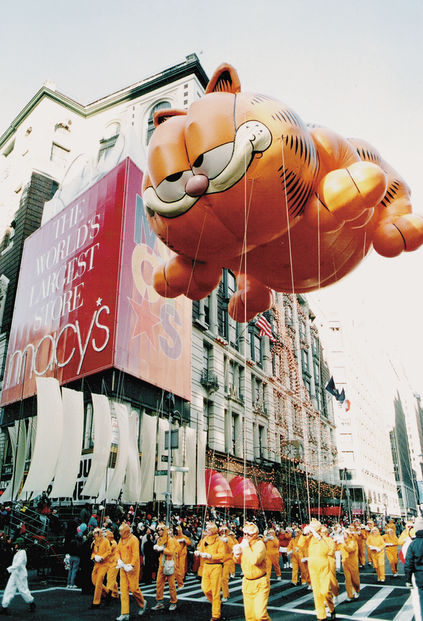 The Garfield balloon flies in the Macy's Thanksgiving Day Parade.