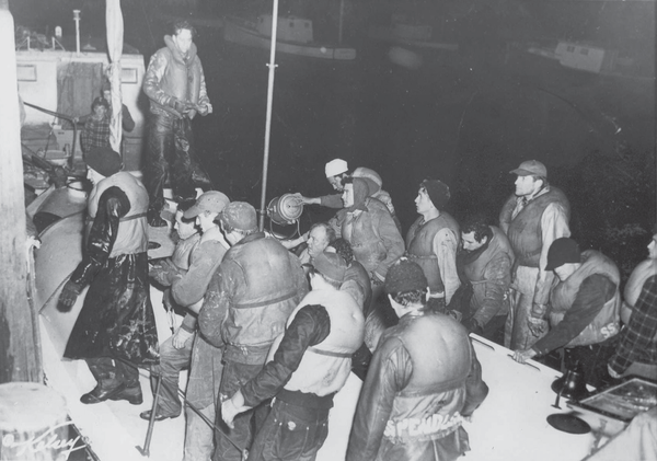 The survivors of the SS Pendleton being escorted back to shore after being saved by the US Coast Guard.