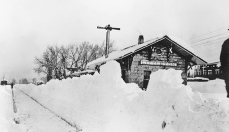 A buried train depot during the 1913 blizzard of Littleton, Colorado.