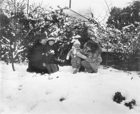 Children with their parents during a historic California snowstorm.