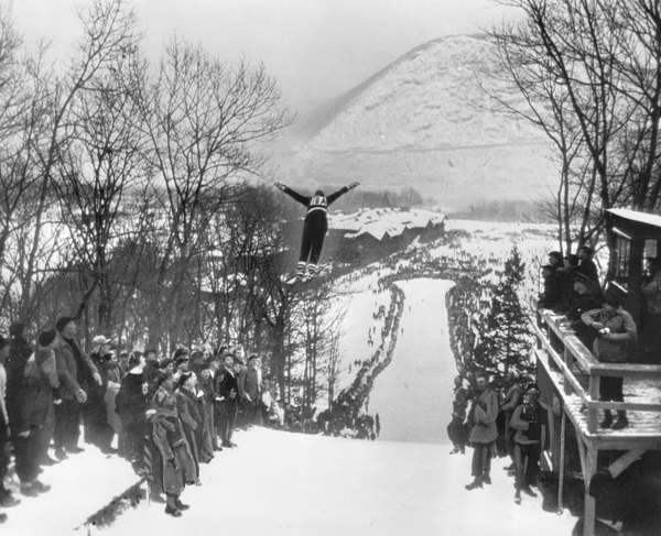 Ski jumper Odd Hirsheim begins a jump off the ramp at Bear Mountain State Park