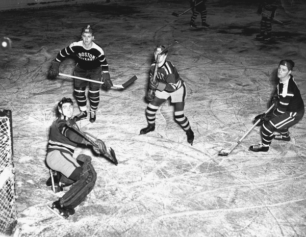 The Boston University hockey team faces off against Massachusetts Institute of Technology’s team in the 1940s.