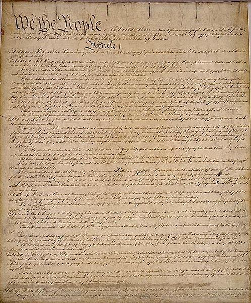 The first page of the US Constitution. Public domain image via Wikimedia Commons.