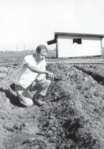 David Lett christening the first planting at Eyrie Vineyards in the Willamette Valley. Reprinted from Oregon Wine Country Stories: Decoding the Grapes by Kenneth Friedenreich (pg 37, The History Press, 2018).